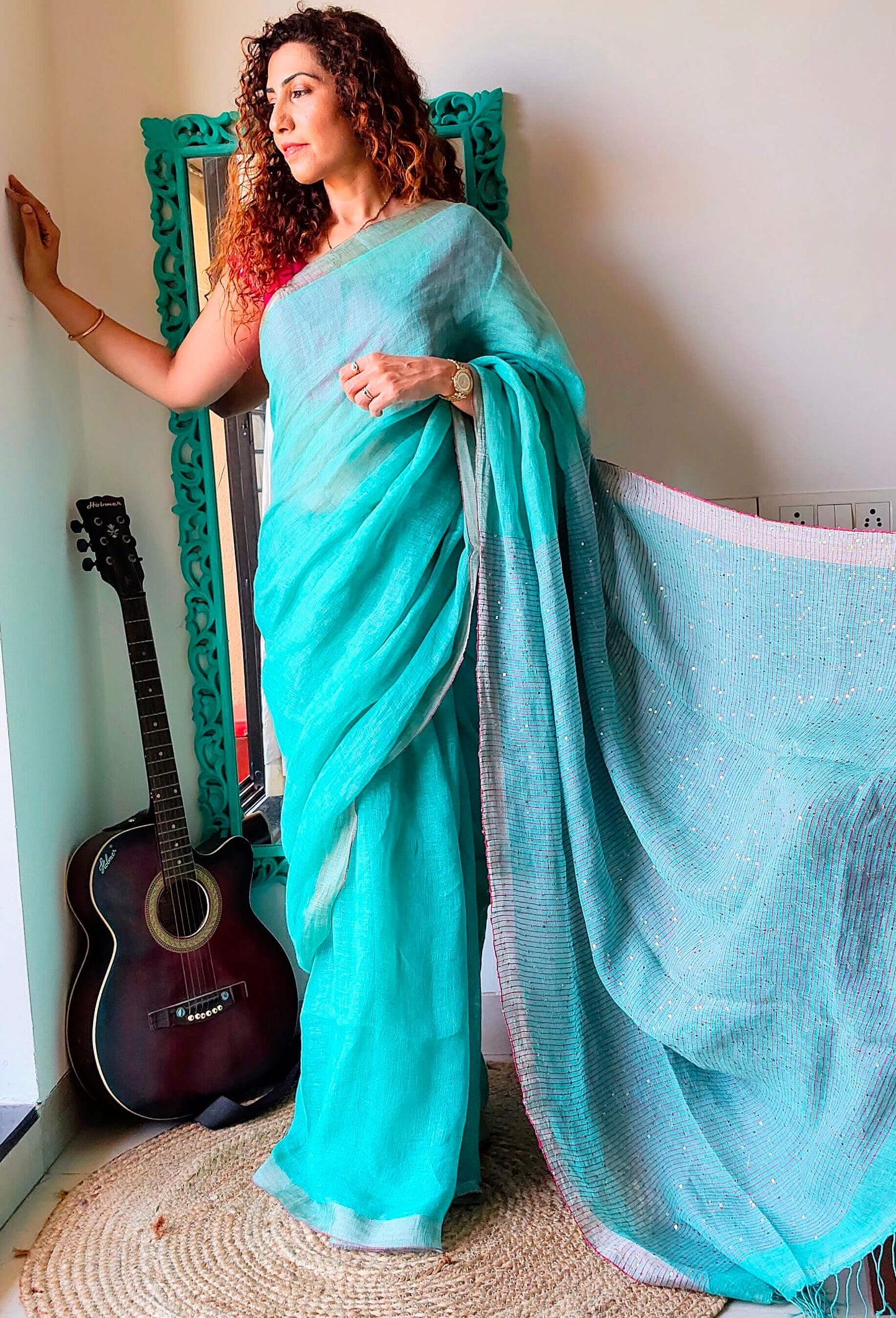 Aqua green Linen Saree with sequence