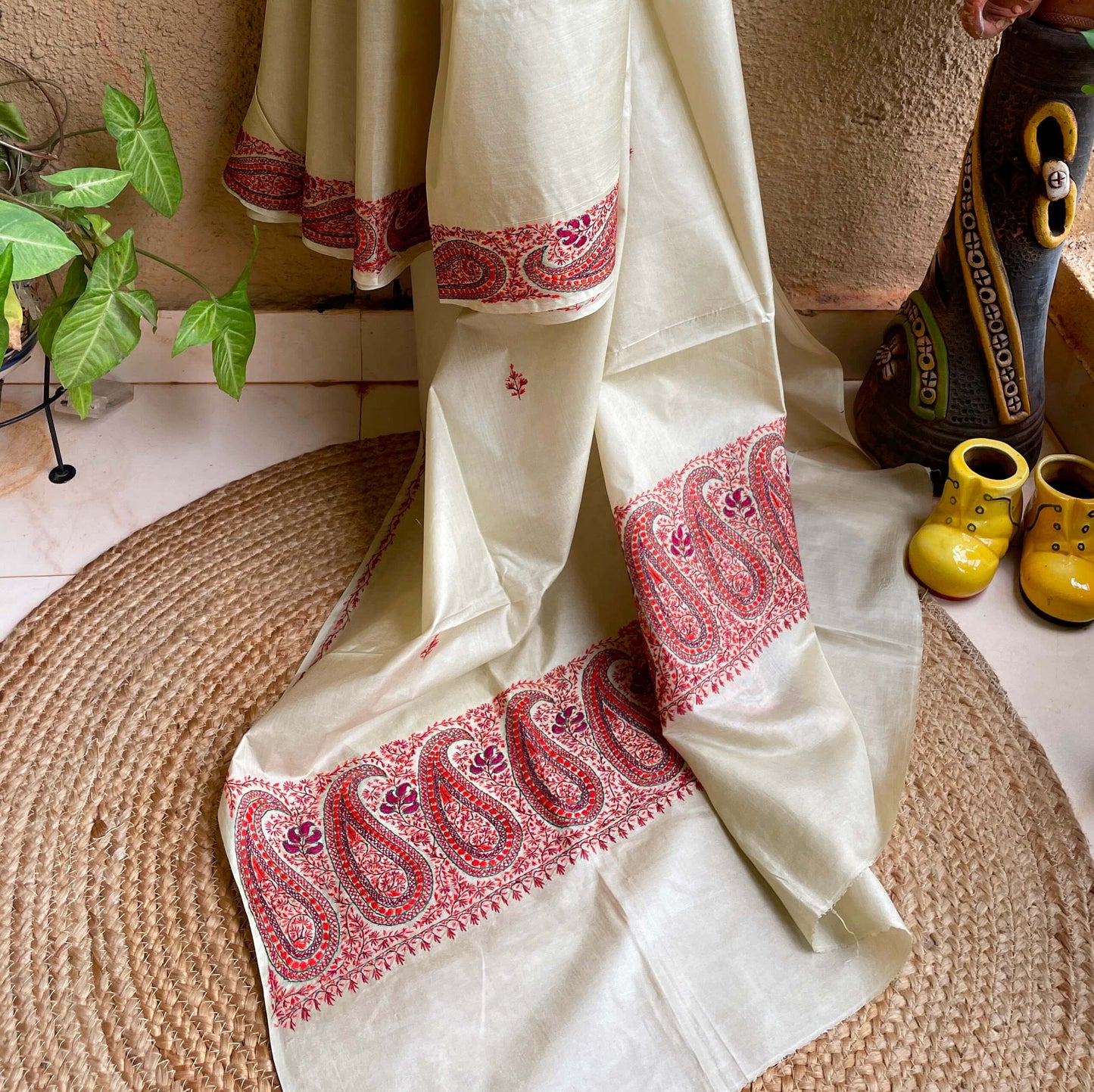 Off white Silk with Paisley Sozni embroidery saree