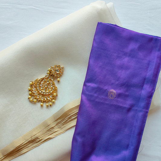 white organza silk saree with zari blouse